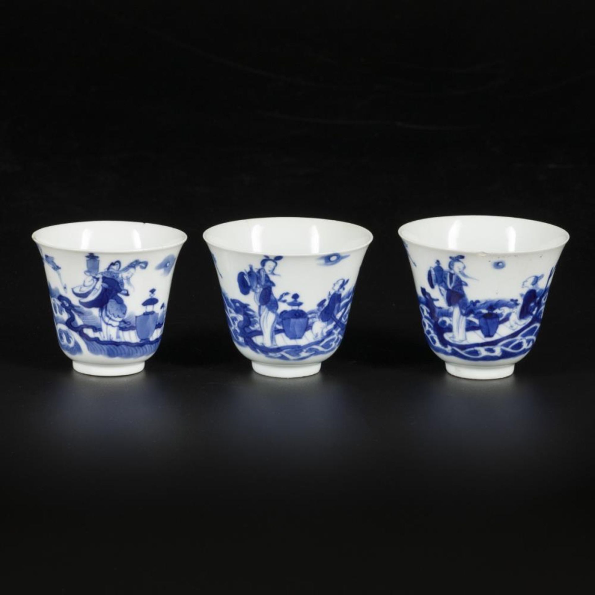A set of (3) porcelain cups with decoration of Chinese figures, China, Kangxi.