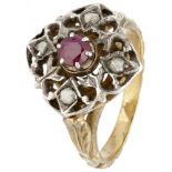 14K. Yellow gold and 835/1000 silver openwork ring set with diamond and ruby.