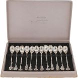 (12) piece set of silver flower teaspoons.