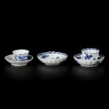 A lot comprised of (3) porcelain ribbed dishes and two cups with floral decoration and river landsca