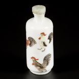 A porcelain snuff bottle decorated with roosters, China, 19th century.