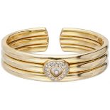18K. Yellow gold Chopard 'Happy Diamonds' bangle bracelet.