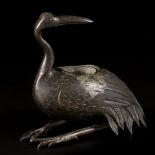 A bronze incense burner in the shape of a crane.