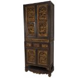 A Chinese bridal cabinet decorated with carvings, China, 20th century.