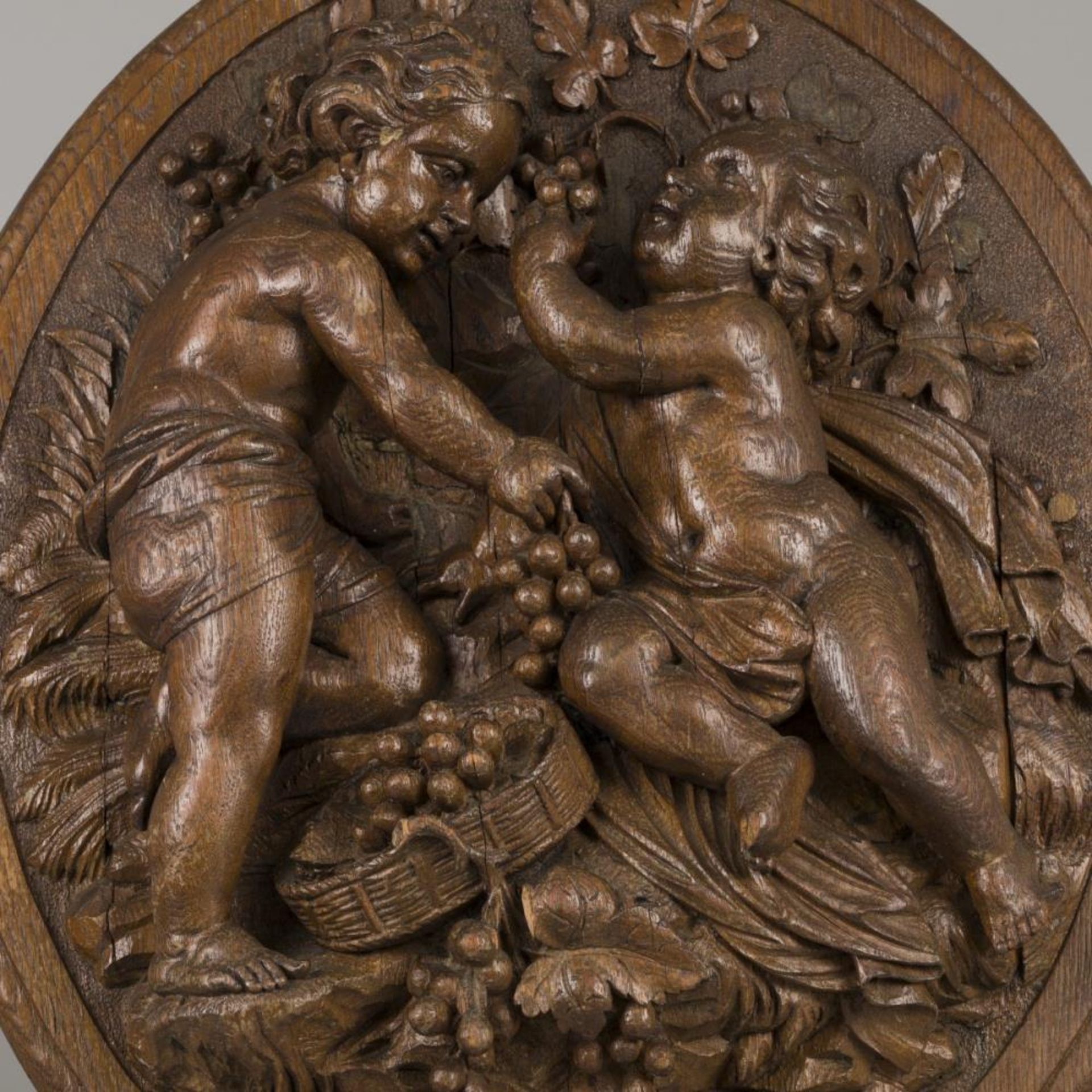 An oak carving of putti harvesting grapes (autumn), Belgium, 19th century. - Image 2 of 4