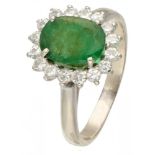 BLA 10K. White gold rosette ring set with approx. 0.48 ct. diamond and approx. 1.40 ct. emerald.