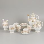 A porcelain coffee/tea set with floral decorations, France, early 19th century.