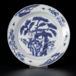 A porcelain plate with landscape decor, marked Chenghua, China, Kangxi.