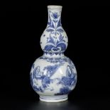 A porcelain gourd-shaped vase with decor of figures in garden and tulips, China, Transition.
