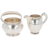 (2) piece creamer set silver.