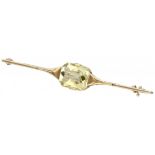 14K. Yellow gold Art Deco brooch set with approx. 4.02 ct. synthetic yellow sapphire.