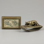 A bronze cast blotter with lurking lioness, together with a copper box for playing card, ca. 1880.