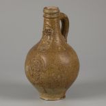 A bartmann/ 'Bartmann' stoneware jug with tiger salt glaze, (Cologne/ Frechen), Germany, ca. 1700.