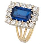 14K. Bicolor gold entourage ring set with approx. 0.70 ct. diamond and approx. 2.19 ct. synthetic sp