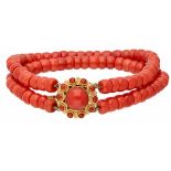 Two-row red coral bracelet with a 14K. yellow gold closure.