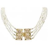 Four-row antique pearl necklace with a 14K. yellow gold filigree closure with seed pearl.