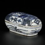 A porcelain lidded box with decor of a bird in a landscape, China, Wanli.