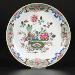 A porcelain dish with famille rose decor and café-au-lait back, China, Yongzheng.