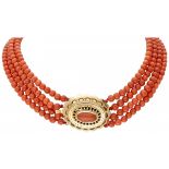 Four-row antique red coral necklace with a 14K. yellow gold large openwork closure.