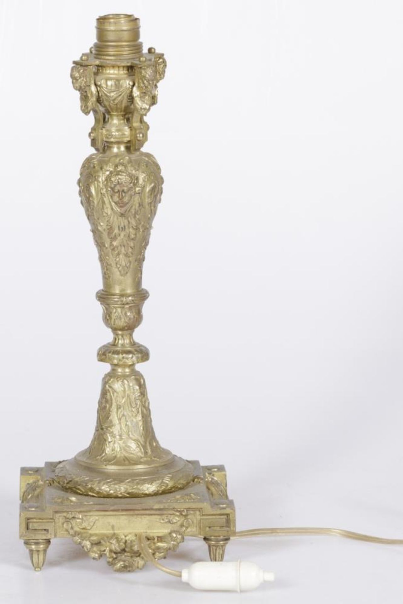 A cast bronze eclictic lamp base