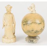A lot comprising a biljiard ball weith dito lion on top, and a chinese figure.