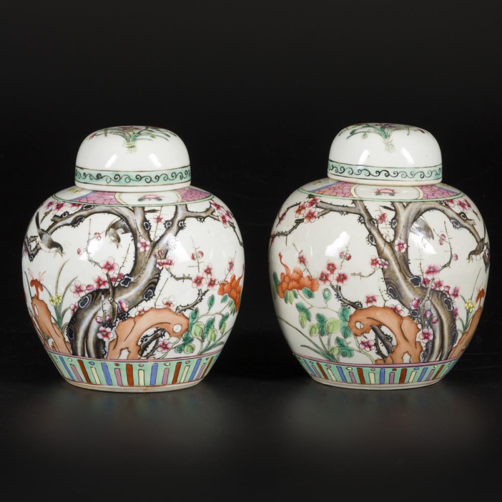 A set of (2) porcelain lidded jars with famille rose decor, China, 1st half 20th century.
