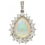 14K. White gold pendant set with approx. 7.58 ct. welo opal and approx. 1.81 ct. diamond.