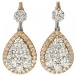 18K. Bicolor gold entourage earrings set with approx. 1.54 ct. diamond.