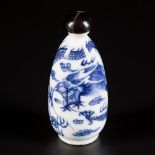 A porcelain snuff bottle with dragon decoration, China, Daoguang.