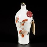 A porcelain famille rose snuff bottle decorated with roosters, with poem and signature of the master