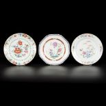 A lot of (3) porcelain famille rose plates with floral decoration, China, 18th century.