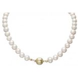 Freshwater pearl necklace with 14K. yellow gold closure.