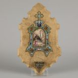 A wall mounted papier mâché holy water font with cloisonné and handpainted plaquette, France, ca. 19