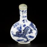 A porcelain snuff bottle with dragon decoration, China, 19th century.