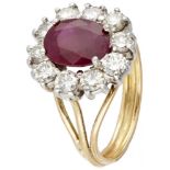 14K. Bicolor gold entourage ring set with approx. 1.20 ct. diamond and approx. 2.06 ct. ruby.