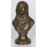 A bonze bust of the Virgin Mary with the immaculate heart.