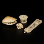 A lot with (4) ivory and bone objects, amongst others netsukes. China, ca. 1900.