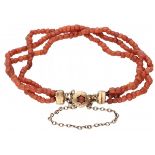 Three-row antique red coral bracelet with a 14K. yellow gold closure.