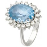 BLA 10K. White gold entourage ring set with approx. 4.25 ct. aquamarine and approx. 0.36 ct. diamond