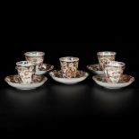 A set of (5) porcelain cups and saucers with Imari decor, Japan, 18th century.