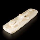 An ivory sculpture of a reclining woman, DRC, first half 20th C.