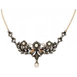 18K. Yellow gold Portuguese necklace with a floral designed silver centerpiece set with diamonds and