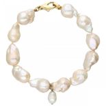 Freshwater Baroque pearl bracelet with an 18K. yellow gold closure.