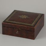 A walnut veneered trinket box with brass and mother of pearl inlay, ca. 1900.