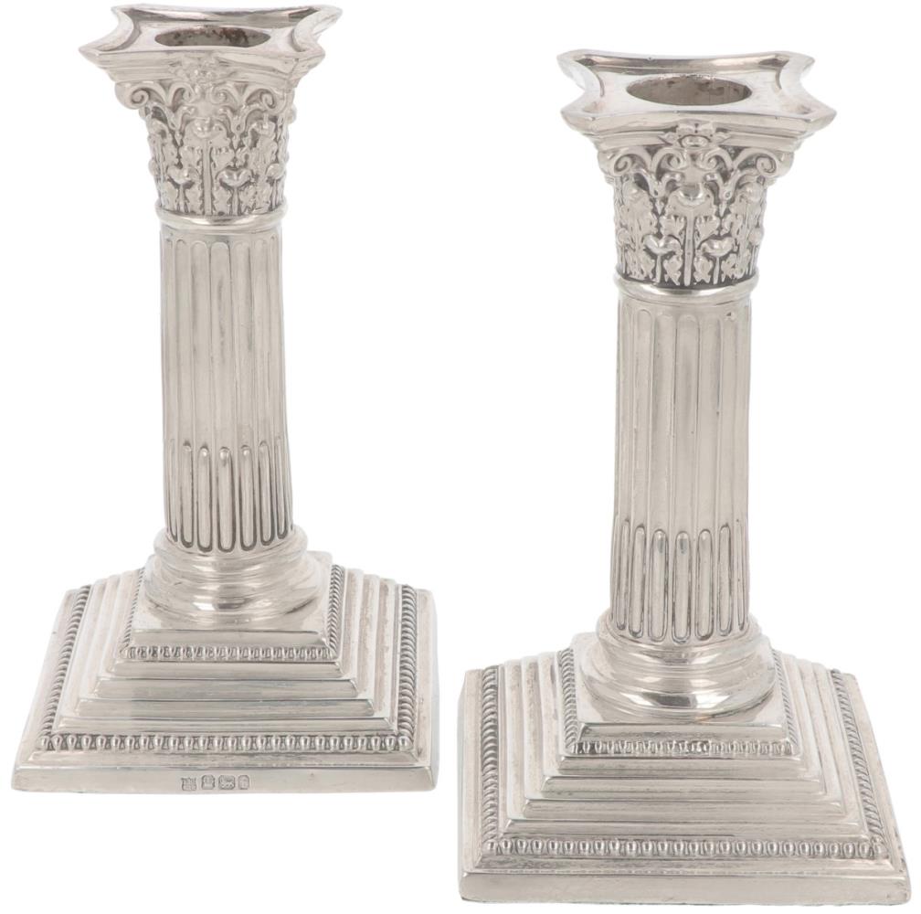 (2) piece set of table candlesticks silver.