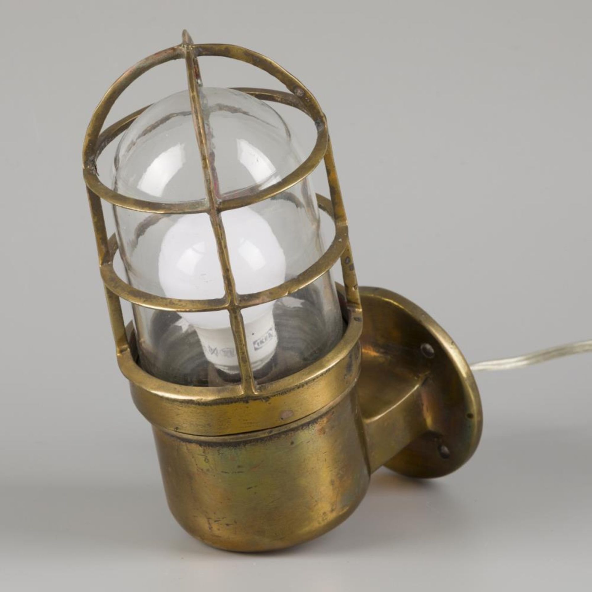 A brass wall-/ cage lamp, Asia(?), 20th century.
