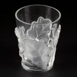 A crystal table vase with a decoration of oak leaves, marked at the bottom 'Lalique France'. France,