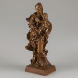 A carved oakwood statue depicting mother and child, Belgium, 1st half 20th century.