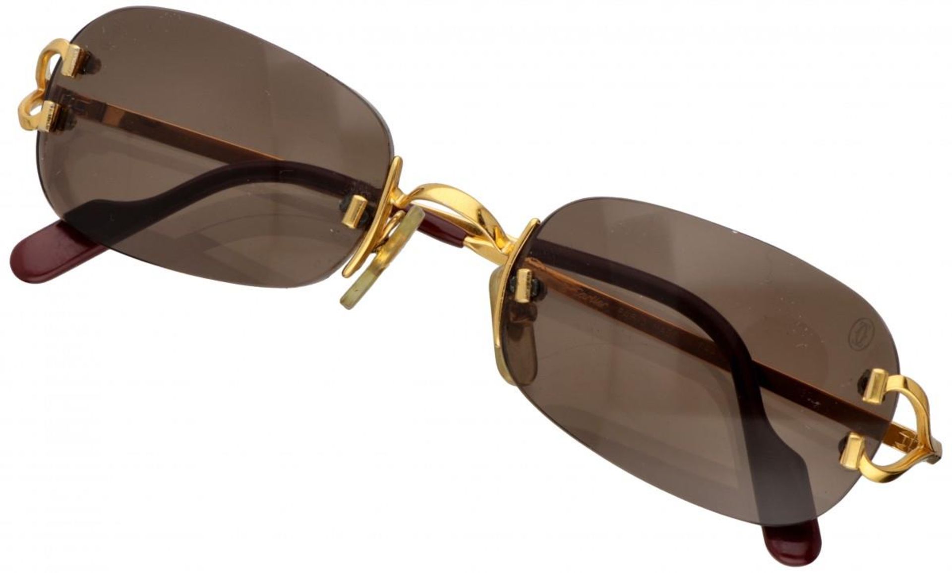 18K. Gold plated Cartier 'C Decor' rimless vintage sunglasses with brown lenses.