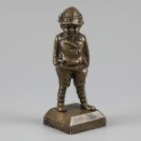 A bronze sculpture of a toddler with his hands in his pockets, Belgium, ca. 1920.